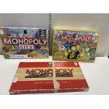 Three assorted boxed Monopoly board games (unchecked)