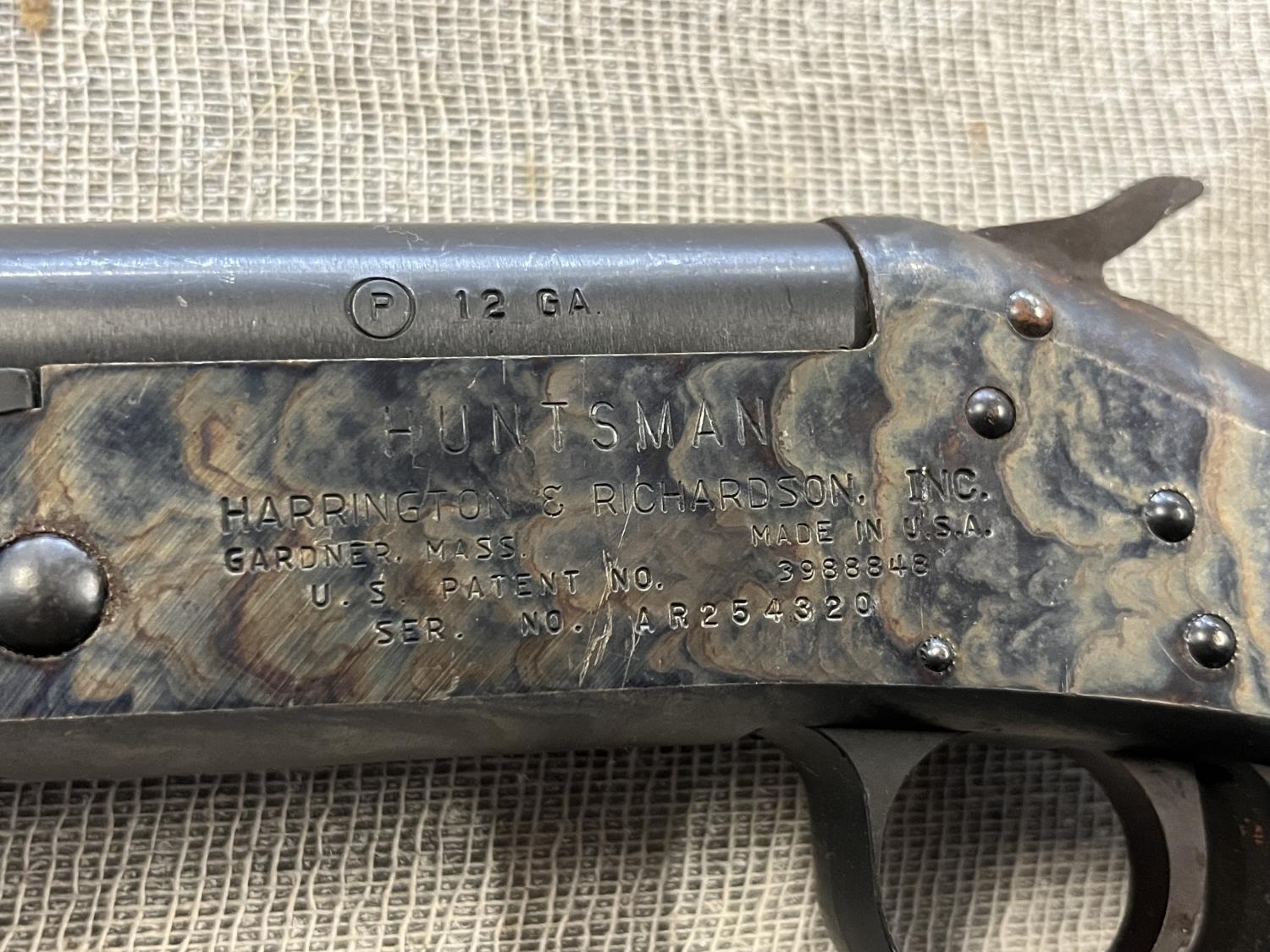 A Harrington & Richardson single shot 12 bore shotgun. Black powder only. Serial number AR25430 ( - Image 2 of 5