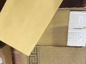 A box of new c4 manila envelopes