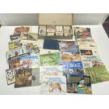 A large selection of assorted tea card albums and loose cards