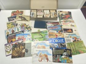 A large selection of assorted tea card albums and loose cards