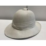 A WW2 Pith helmet by Failsworth Hats Ltd dated 1942 with broad arrow