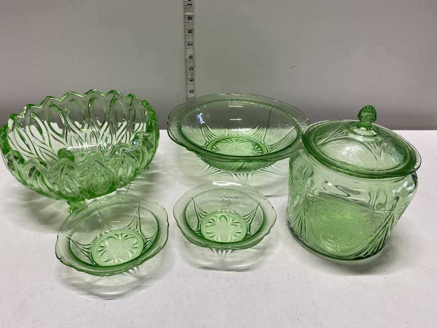 Five pieces of vintage green uranium glass, shipping unavailable