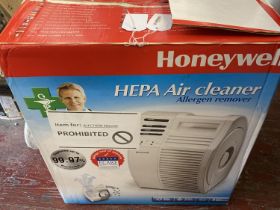 A boxed Honeywell HEPA air cleaner (untested), shipping available