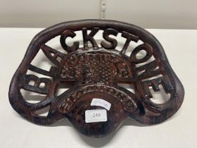 A reproduction cast iron Blackstone tractor seat