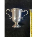 A small hallmarked silver trophy 68.72 grams.