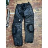 A pair of Frank Thomas leather motorbike trousers W32