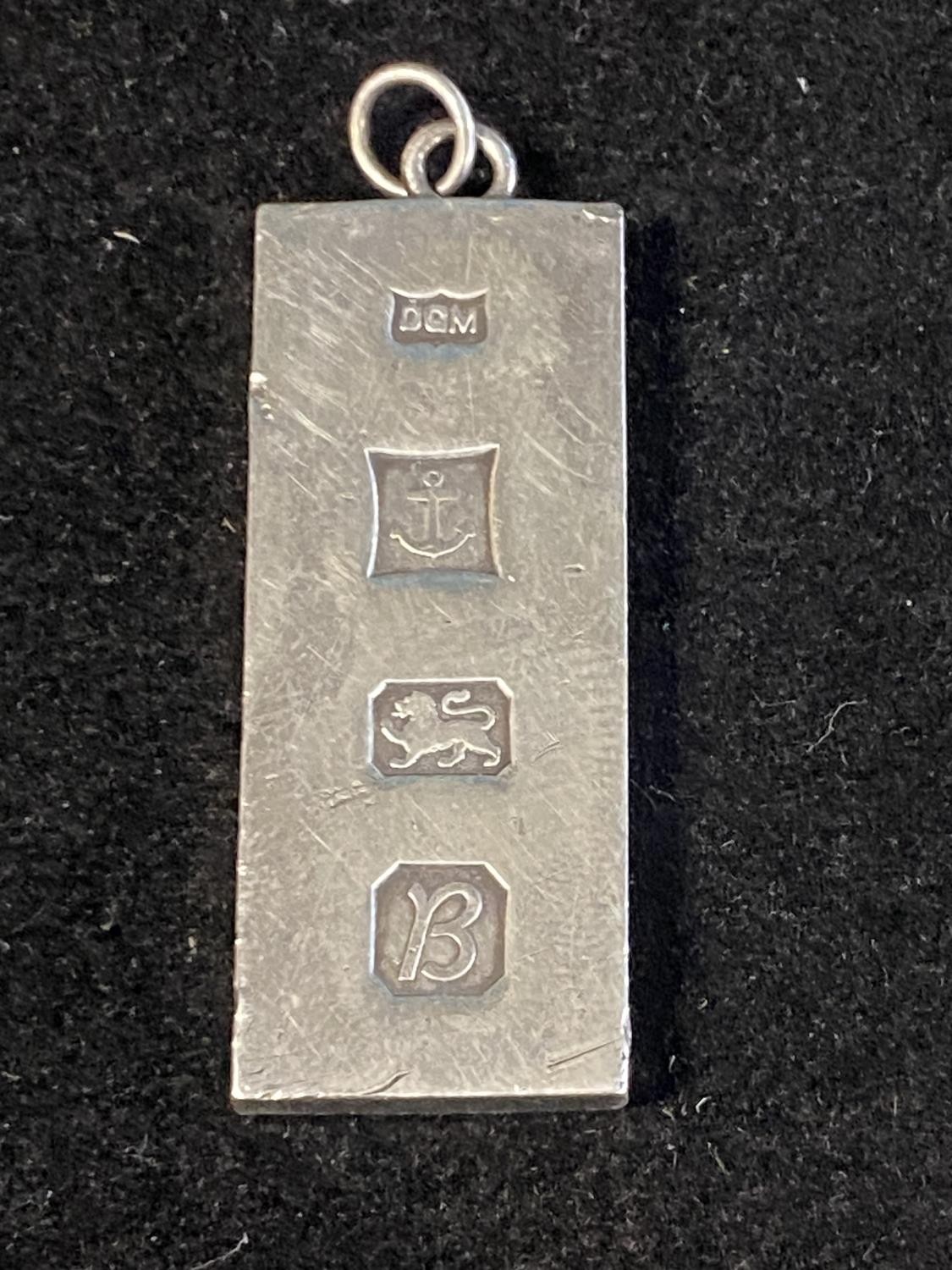 A 1oz solid silver hallmarked ingot 31.84g