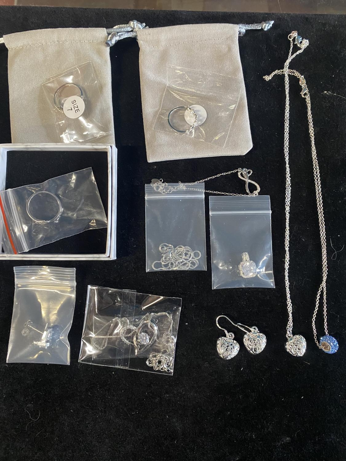 A selection of new assorted jewellery sets and rings all stamped 925