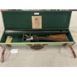 A antique Wesley Richards 12 bore side by side shotgun. Shipping unavailable