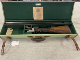 A antique Wesley Richards 12 bore side by side shotgun. Shipping unavailable