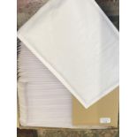 A box of new A4 padded envelopes