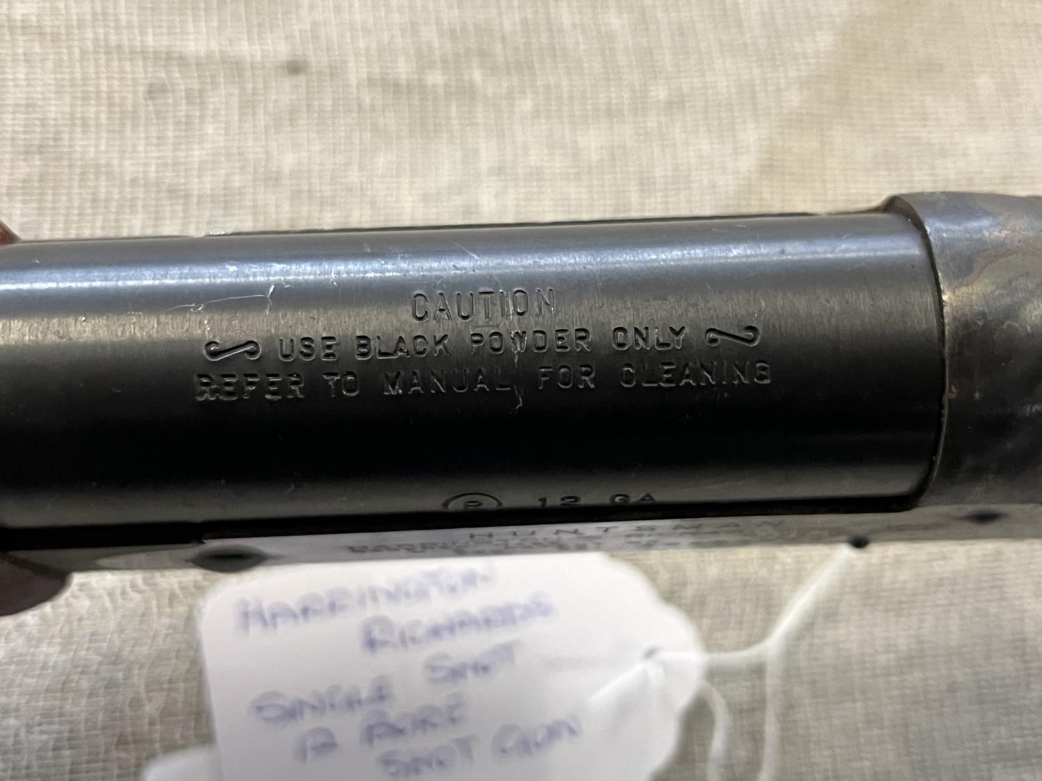 A Harrington & Richardson single shot 12 bore shotgun. Black powder only. Serial number AR25430 ( - Image 3 of 5