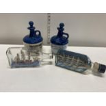 Two vintage ships in a bottle with two ceramic Lambs Navy Rum decanters, shipping unavailable