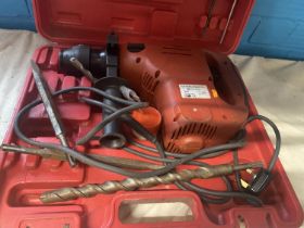 A boxed 240v hammer drill (untested), shipping unavailable