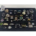 A large selection of assorted costume jewellery dress rings (some stamped 925)