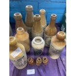 A selection of assorted salt glazed antique bottles of local interest, shipping unavailable