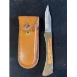 A foldable lock knife with leather case