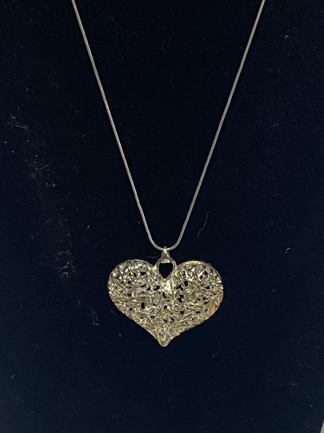 A 925 silver chain and heart pendant