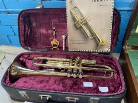 A cased Lafleur brass trumpet