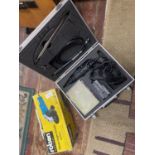 A boxed Dremel multi tool and a 150mm angle grinder (untested), shipping unavailable