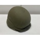 A 1980's US Army PASGT helmet made by Gentex Corporation size large