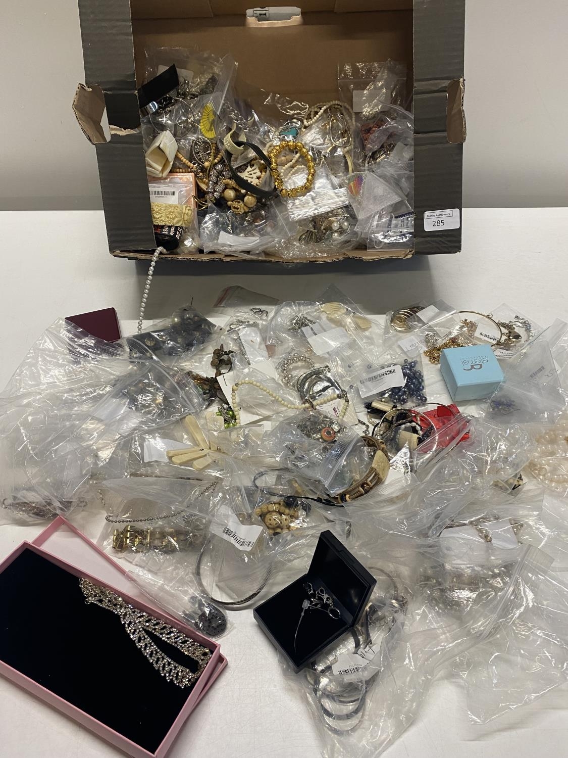 A large box of assorted costume jewellery