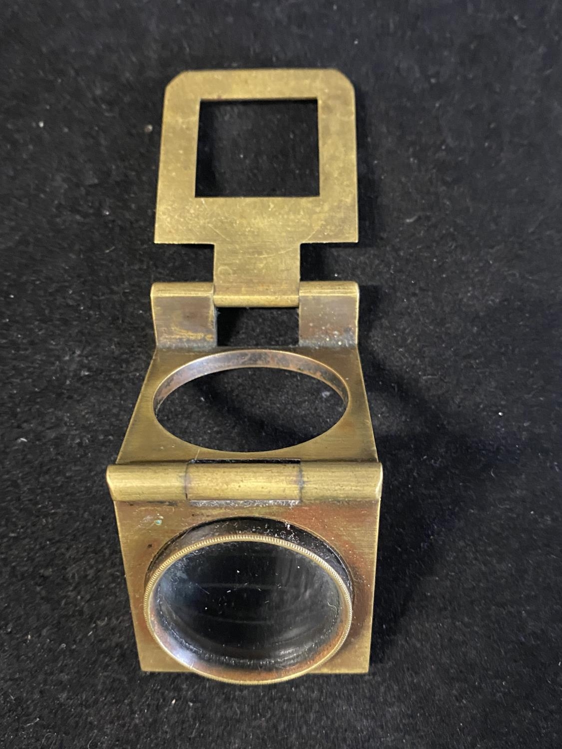 A vintage brass jeweller/watch makers magnifying lens