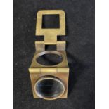 A vintage brass jeweller/watch makers magnifying lens