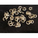 A large collection of new white metal earrings