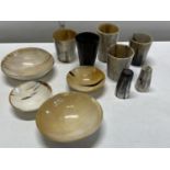 A selection of assorted horn items including beakers and other