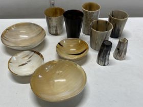 A selection of assorted horn items including beakers and other