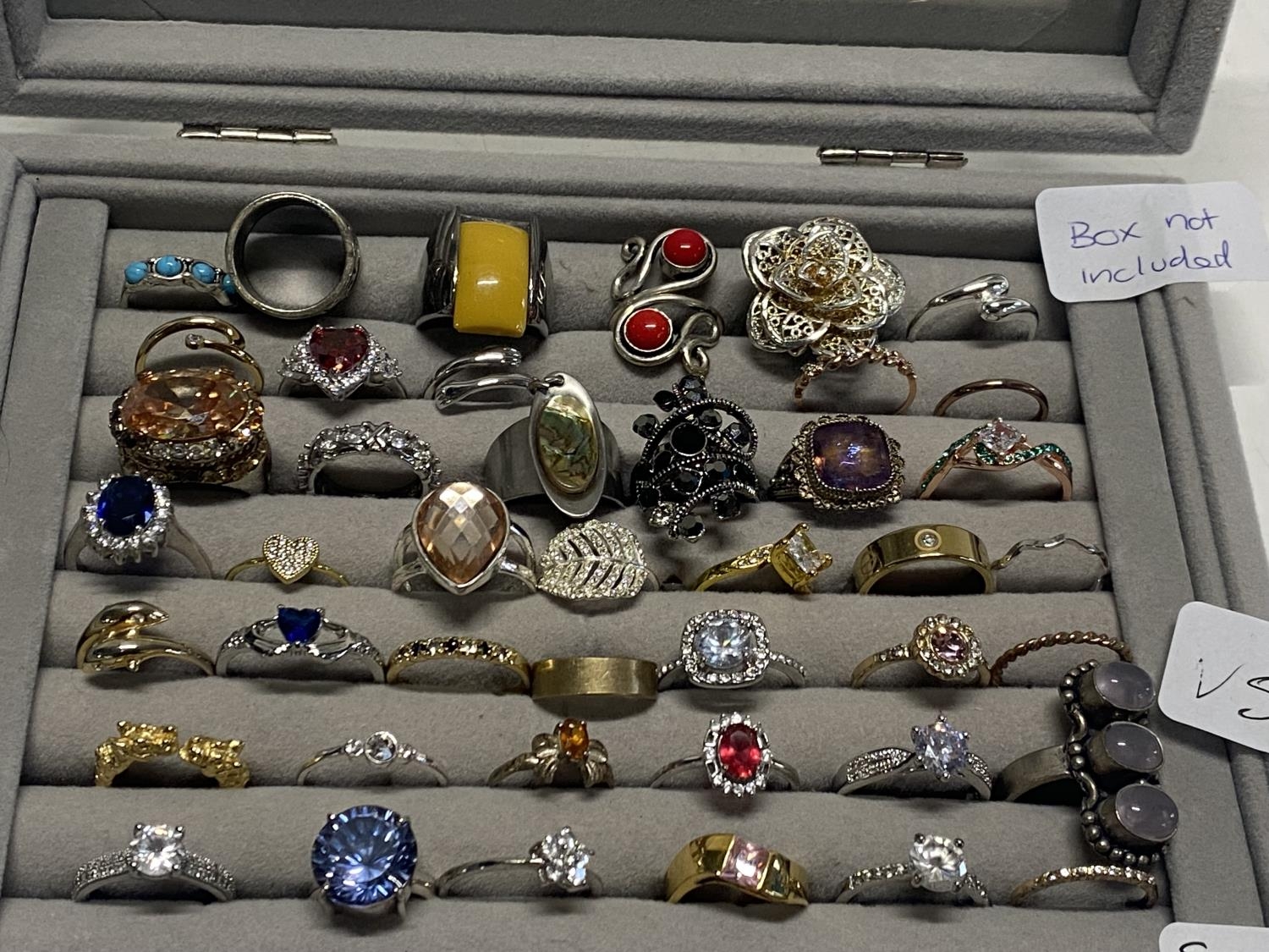 A large selection of assorted costume jewellery dress rings (some stamped 925)