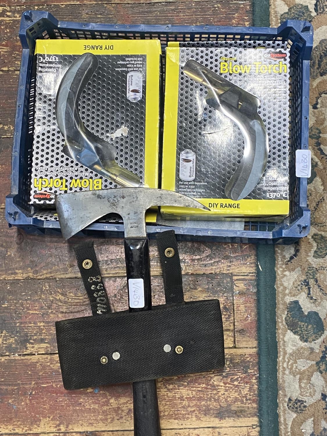 Two new boxed blow torches and a Stanley axe. Shipping unavailable