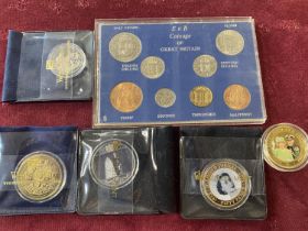 A selection of assorted commemorative coins and other