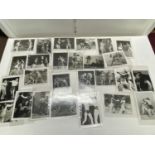 A good selection of assorted vintage erotic prints depicting women boxers