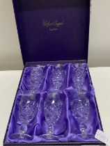 A set of six boxed Watford hand cut crystal wine glasses, shipping unavailable