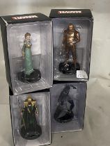 Four boxed Marvel figures