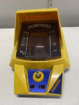 A vintage Frogger electronic table top game. (untested)