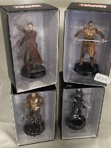 Four boxed Marvel figures