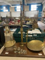 A unusual large set of brass scales on a wooden plinth, complete with glass weights. No shipping