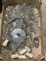 A box full of vintage glass drops and accessories for lustres and ceiling lights etc. No shipping