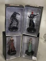 Four boxed Marvel figures