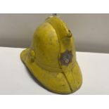 a vintage fire service helmet