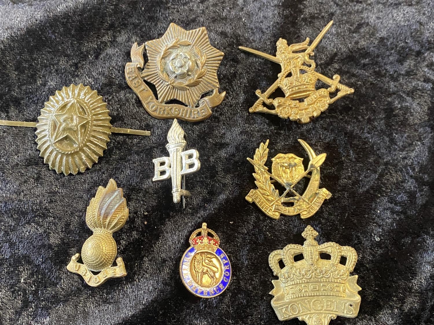 A selection of British military cap badges