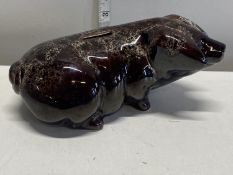 A Cornish Kernewek Pottery Pig money bank