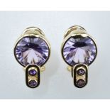 Paar Amethystohrstecker mit Clipmechanik.  Amethyste facettiert 3,06 ct. 14 ct. RG