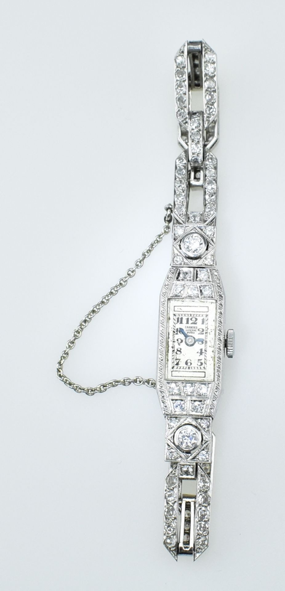 Feine Bucherer Art-Déco-Damenarmbanduhr.  Gehäuse und Glieder mit Millegriffesfassung, mit Diamante