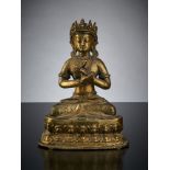 Sitzender Buddha.  Gelbguß. H 19 cm