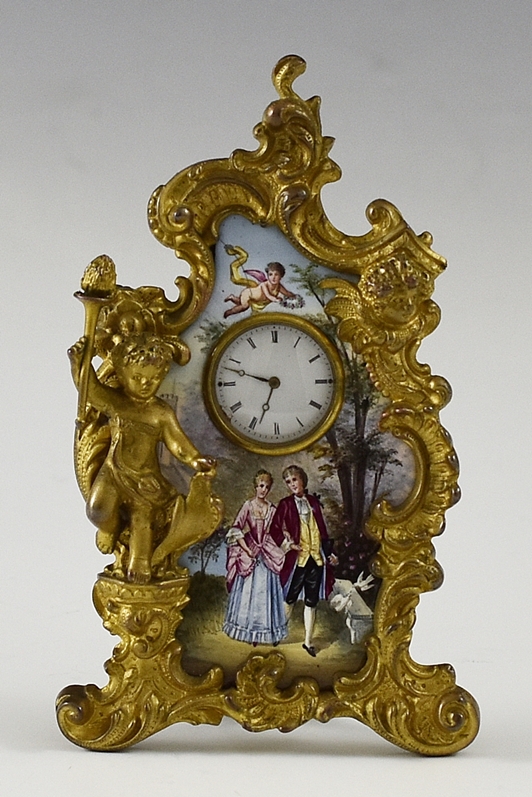 Sehr feines Portemontre. Mit goldener Damenuhr 14. ct. Bronze doré-Gehäuse mit Stilelementen des R